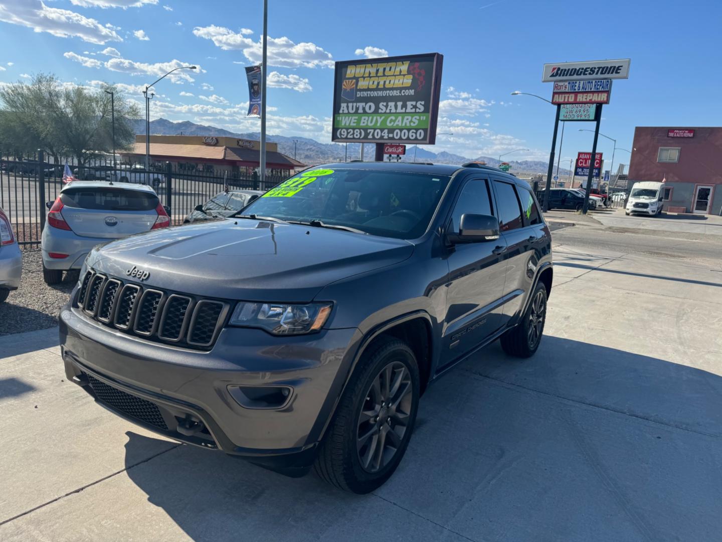 2016 grey Jeep Grand Cherokee (1C4RJFBG0GC) , located at 2190 Hwy 95, Bullhead City, AZ, 86442, (928) 704-0060, 0.000000, 0.000000 - 75th anniversary edition. clean carfax. jeep grand cherokee limited 4 wd. Leather loaded. 81k miles. free and clear title. - Photo#23